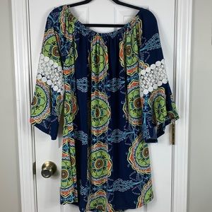 Win Win pinwheel sleeve tunic size 2XL-3XL. Navy blue multi colored flowers